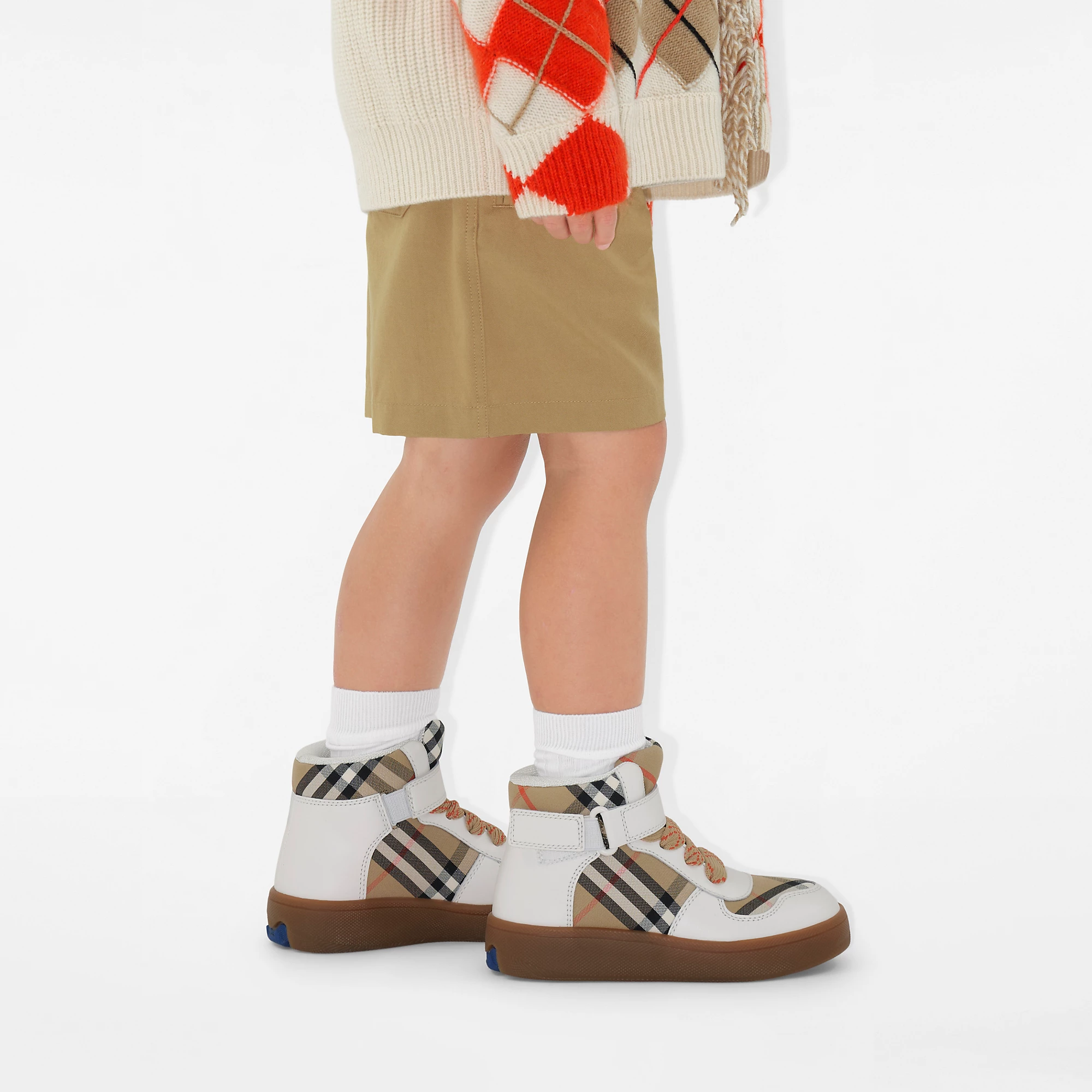 22335-check-and-leather-high-top-sneakers-1.webp